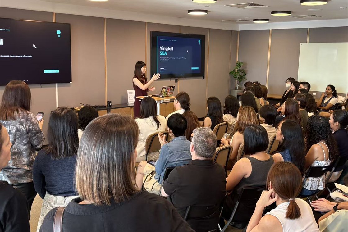 Yingying Li presenting Yingtell SEA to a full room at a community event in Singapore